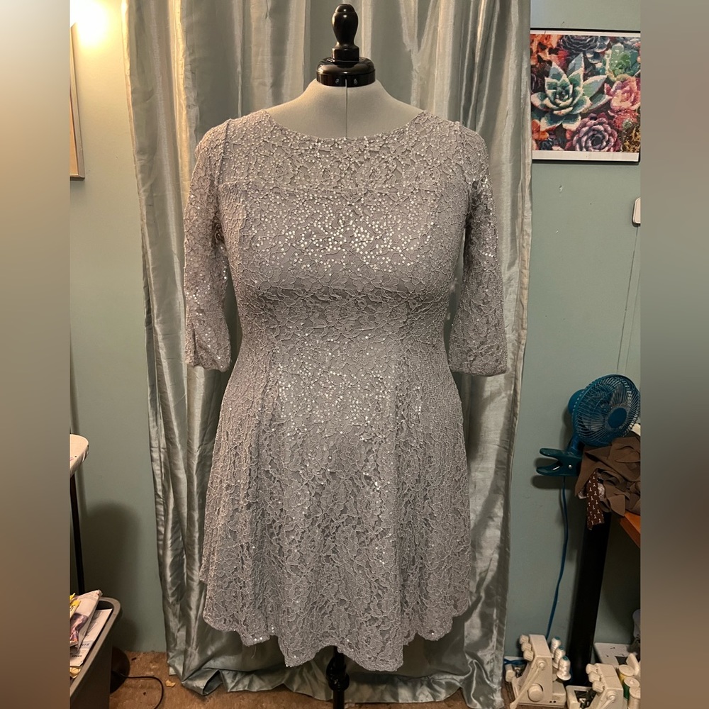 Long sleeve, mid thigh, sequined dress